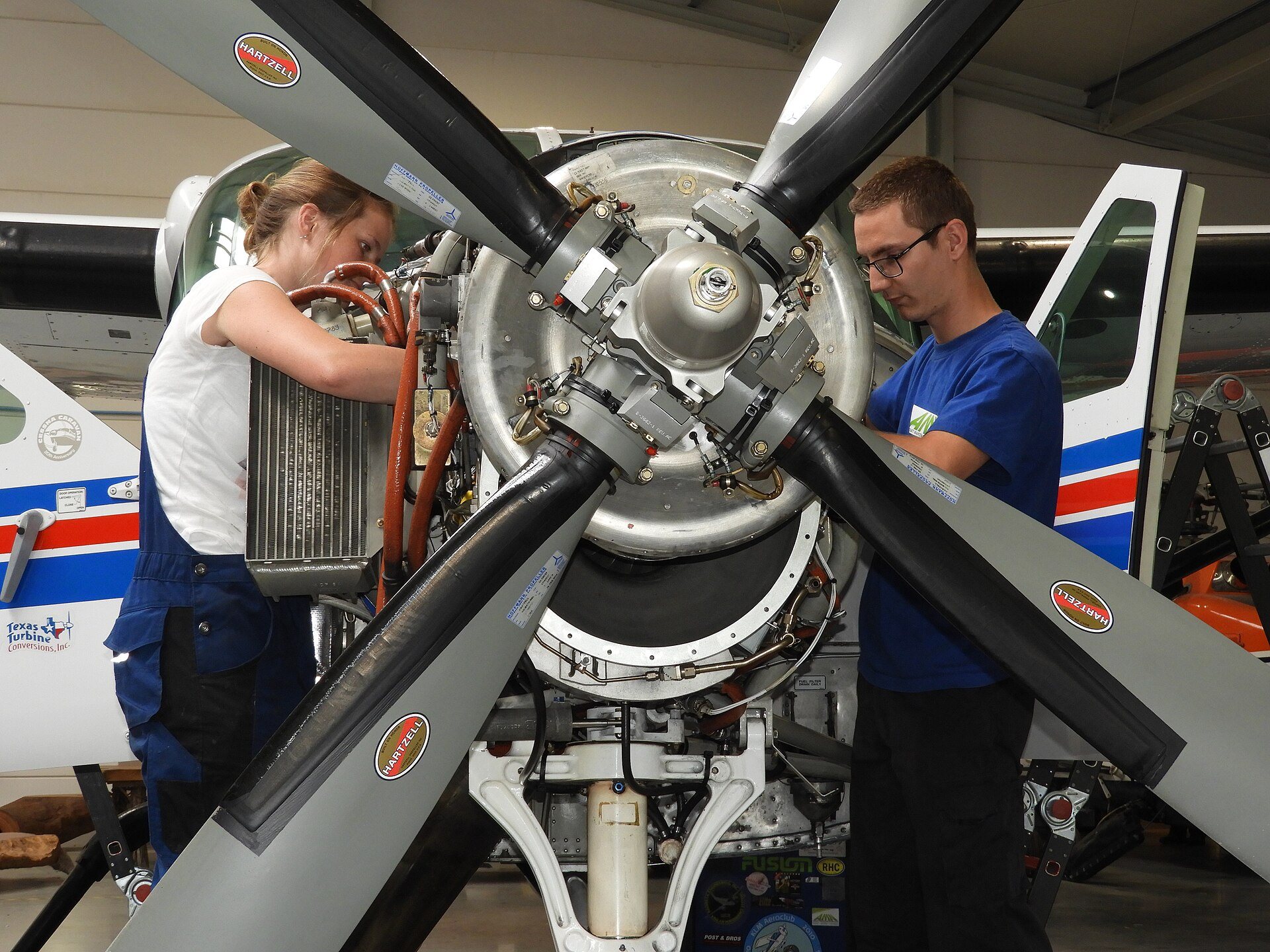 Maintenance technicians at an engine